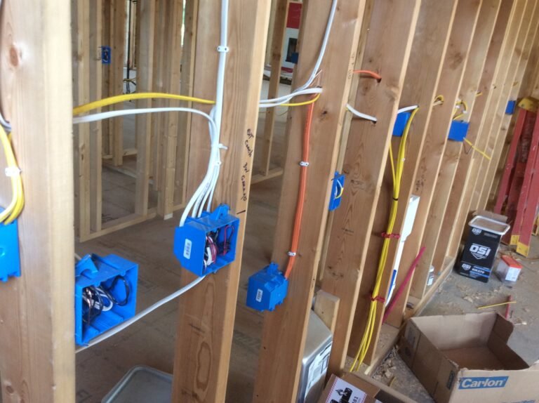 Wiring being done in framing.